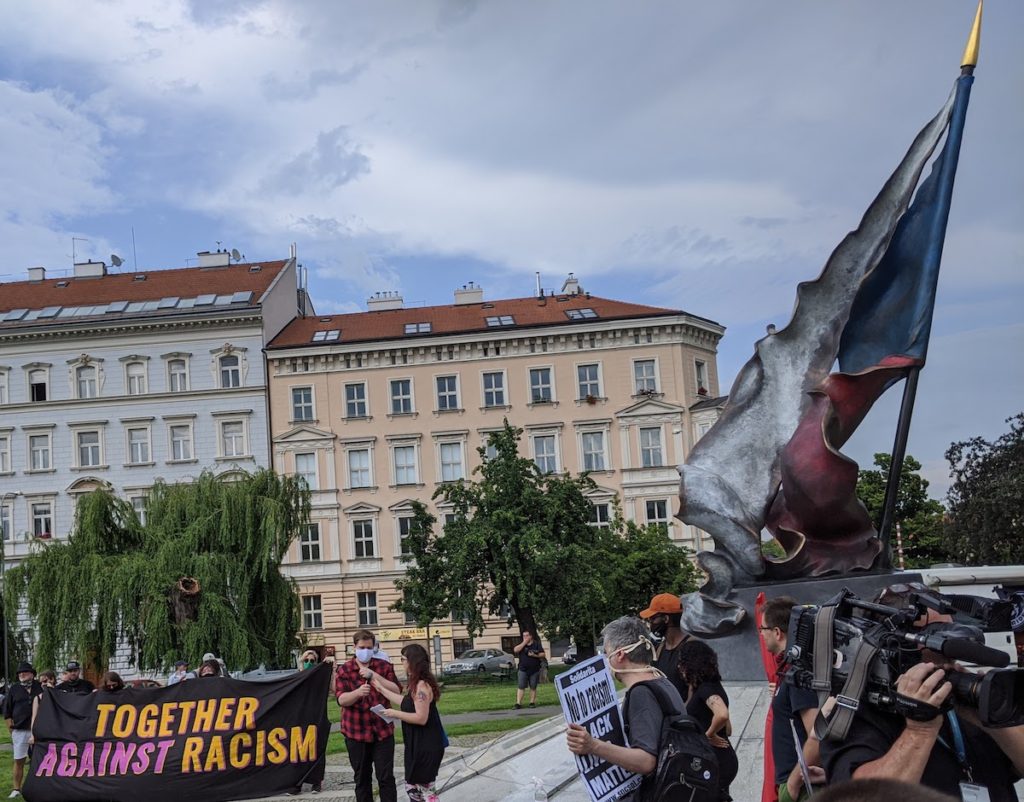 antiracism poster at Resistance Flag Monument in Prague