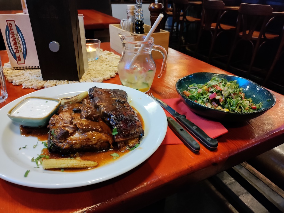 pork ribs and salad at Cuban restaurant